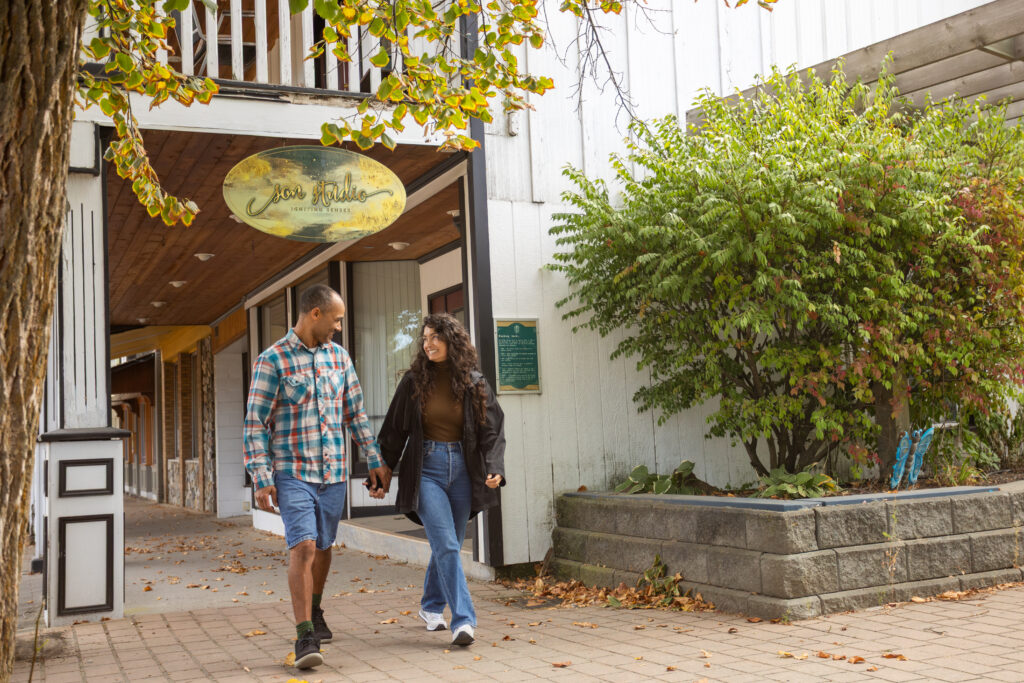 Two people wandering in downtown Armstrong